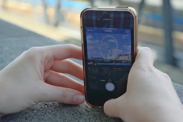 london eye, phone, hands, wheel, london, photo, iphone, instagram, technology, mobile, popular, photography, attraction, screen, camera, instagram, instagram, instagram, instagram, instagram. A guide to measuring UK travel creator campaigns with ONS and VisitBritain data