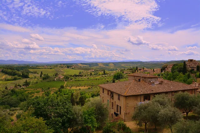 sky, clouds, campaign, nature, green, landscape, saint gimignano, tuscany, italy, tourism, agriculture. When to agree travel creator campaigns key metrics