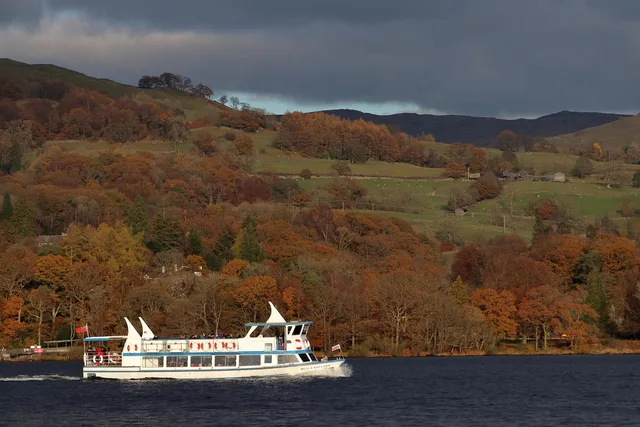 windermere, boat, england, lake district, cumbria, water, landscape, hiking, scenic, scenery, nature, outdoors, uk, britain, countryside, tourism, autumn, rural, hills, trees, brown boat. Travel creator campaigns reviews explained for UK tourism teams