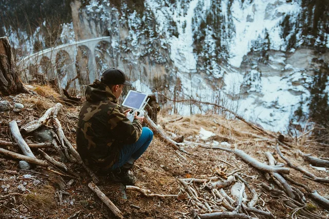 people, woman, travel, adventure, tablet, nature, landscape, roots, trees, woods, forest, brown tablet. Seven travel creator campaigns survey tools compared for UK teams